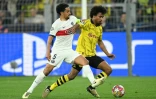 Le défenseur brésilien du Paris Saint-Germain Marquinhos à la lutte avec l'attaquant allemand de Dortmund Karim Adeyemi lors de la demi-finale aller de Ligue des champions entre les deux clubs, le 1er mai 2024 à Dortmund.
