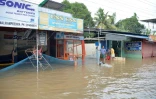 Décrue progressive à Paravur, en banlieue de Chochin, au Kerala indien, le 20 août 2018