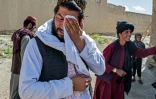 Ismail Ashuqullah, un kamikaze formé par les talibans, pleure lors d'un entretien avec l'AFP dans le village d'Otarhi, le 25 mai 2023 dans la vallée de Tangi, en Afghanistan