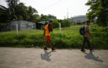 Des migrants vénézuéliens dans une rue de Tecun Uman, au Guatemala, le 17 mai 2022 à la frontière avec le Mexique