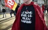 Un manifestant porte un T-shirt anti Marine Le Pen pour protester contre la venue la candidate d'extrême droite à la présidentielle, le 25 février 2017 à Nantes