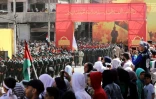Parade militaire pour la journée d'Al Qods, dans le camp de réfugiés palestiniens de Yarmouk, le 5 avril 2024 à Damas, en Syrie