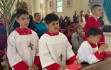 Des fidèles célèbrent le dimanche des Rameaux à la Sainte-Famille, seule église catholique de la ville de Gaza, le 24 mars 2024