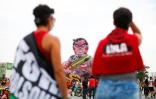 Des manifestants défilent pour la destitution du président d'extrême-droite Jair Bolsonaro, à Brasilia le 2 octobre 2021