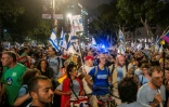 Des manifestants lors d’un rassemblement contre le Premier ministre israélien Benjamin Netanyahu à Tel-Aviv, le 24 octobre 2026