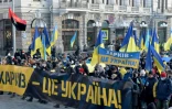 "Kharkiv c'est l'Ukraine", peut-on lire sur la banderole tenue par des manifestants dans cette ville de l'est, le 5 février 2022.