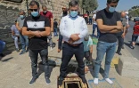 Des Palestiniens privés d'accès à la mosquée Al-Aqsa en raison des restrictions anticoronavirus prient en plein air à Jérusalem le 25 septembre 2020