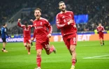 Le milieu de Liverpool Dominik Szoboszlai (à droite) après son penalty victorieux contre l'Inter Milan en Ligue des champions, le 9 décembre 2025