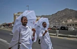 Des musulmans marchent le 7 juillet 2022 à Mina, près de la Grande Mosquée de La Mecque, pour effectuer un des rites majeurs du hajj