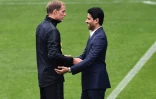 Accolade entre le président du PSG Nasser Al-Khelaïfi et Thomas Tuchel en marge d'une séance d'entrainement au Camp des Loges, le 13 septembre 2018