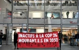 Le mouvement Extinction Rebellion manifeste à Paris le 31 octobre 2021, avant le début de la COP26 à Glasgow