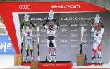 Le vainqueur du slalom géant d'Alta Badia, le Français Alexis Pinturault, entouré du Norvégien Atle Lie McGrath (2e, g) et du Suisse Justin Murisier