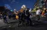 Heurts entre police et manifestants devant le siège du gouvernement, le 10 août 2018 à Bucarest, en Roumanie