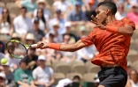 Le Canadien Félix Auger-Aliassim face à l'Italien Fabio Fognini, lors du premier tour de Roland-Garros, le 29 mai 2023