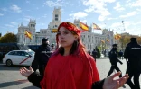 Une activiste du mouvement Extinction Rebellion sur la place de Cibeles à Madrid, le 3 décembre 2019