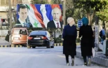 Les portraits du présiden syrien Bachar al-Assad et du président russe Vladimir Poutine, le 9 mars 2017, à Alep, en Syrie