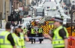 La police et d'autres services d'urgence sur les lieux d'un incident mortel à l'arme blanche au Park Inn Hotel dans le centre de Glasgow le 26 juin 2020