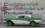 "Nous continuons la Révolution", affirme un mur de la Havane, le 20 mars 2018