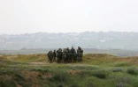 Soldats israéliens sur une position proche de la frontière avec Gaza, dans le sud d'Israël le 20 mars 2025