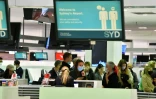 Des voyageurs à l'aéroport de Sydney, le 19 avril 2021 en Australie