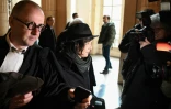 Yildune Levy arrive avec son avocat Jean-Christophe Tymoczko au tribunal correctionnel de Paris pour l'ouverture du procès du "groupe de Tarnac", le 13 mars 2018