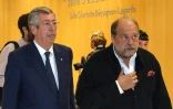 Le maire LR de Levallois-Perret Patrick Balkany (g) et son avocat Eric Dupond-Moretti quittent le tribunal, le 13 mai 2019 Ă Paris