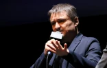 Le cinéaste roumain Cristian Mungiu s'exprime sur scène dans le cadre du 60e Festival du film de New York, à l'Alice Tully Hall du Lincoln Center, le 9 octobre 2022, à New York