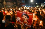 Le portrait d'Aung San Suu Kyi lors d'une veillée à la mémoire des personnes tuées dans les manifestations contre le coup d'Etat militaire en Birmanie, le 13 mars 2021 à Rangoun