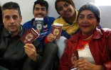 Des migrants vénézuéliens attendent d'entrer en zone d'embarquement de l'aéroport international de Lima après avoir choisi de revenir dans leur pays via un vol affrêté par le gouvernement de Caracas, le 27 août 2018