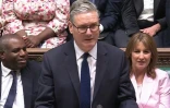 Image tirée d'un enregistrement diffusé par l'Unité d'enregistrement parlementaire britannique (PRU) montrant le Premier ministre britannique, Keir Starmer, prenant la parole lors d'un débat sur le discours du roi, le 13 mai 2026 à Londres