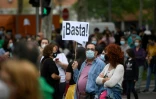 "Assez!", clame cette pancarte lors d'une manifestation, à Madrid le 20 septembre 2020, contre les nouvelles restrictions pour lutter contre le coronavirus