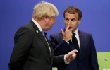 Le Premier ministre britannique Boris Johnson et le président français Emmanuel Macron pendant la COP26 à Glasgow, le 1er novembre 2021