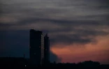 Un nuage de fumée au-dessus de Kiev après un bombardement russe, le 25 mars 2022