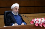 Photo fournie par le bureau de presse présidentiel du président iranien Hassan Rohani lors d'un discours en visioconférence le 10 avril à Téhéran pour annoncer la mise en service de nouvelles centrifugeuses