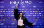 Darina Nikolaeva Yotova, alias Dara, représentant la Bulgarie, avec son trophée après avoir remporté la finale du concours de l'Eurovision à Vienne, le 16 mai 2026