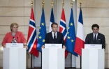Le président français Emmanuel Macron, la Première ministre norvégienne Erna Solberg  et le cheikh qatari Abdulla ben Mohammed ben Saud Al-Thani à l'Elysée, le 06 juillet 2018