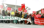 Des activistes de l'ONG Campact manifestent devant la chancellerie allemande où se tiennent des négociations sur le climat, à Berlin, le 19 septembre 2019