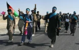 Des Afghans participent à une marche pour la paix, le 8 juin 2018 entre la province du Helmand et Kaboul 
