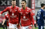 La joie du milieu de terrain de Brest, Romain Faivre, après avoir marqué le 2e but, synonyme de victoire (2-1) face à Bordeaux, lors de leur match de L1, le 7 février 2021 à Brest