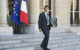 Le ministre français de l'Action et des Comptes publics Gérald Darmanin quitte le Conseil des ministres hebdomadaire au Palais de l'Elysée, à Paris, le 3 août 2018