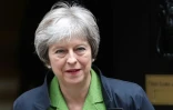 La Première ministre britannique Theresa May quitte le 10, Downing Street pour se rendre à la Chambre des communes le 12 juin 2018 pour un débat sur le Brexit.