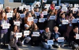 Des défenseurs de l'environnement manifestent devant le palais des congrès de Busan, en Corée du Sud, le 29 novembre 2024