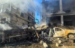 Des bâtiments et des véhicules détruits après une frappe aérienne israélienne sur Tyr, dans le sud du Liban, le 28 mai 2026
