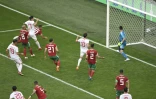 Le Marocain Aziz Bouhaddouz inscrit un but contre son camp contre l'Iran lors du Mondial, le 15 juin 2018 à Saint-Pétersbourg