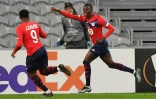 La joie de l'attaquant de Lille, l'Américain Timothy Weah, après avoir ouvert le score contre l'Ajax Amsterdam, lors de leur 16e de finale aller de la Ligue Europa, le 18 février 2021 à Villeneuve-d'Ascq
