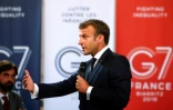 Le président Emmanuel Macron devant des chefs d'entreprise à la veille du sommet du G7, le 23 aoûte 2019 à Paris