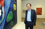 Michel-Edouard Leclerc, à la tête du Fonds Hélène et Edouard Leclerc, centre d'art contemporain de Landerneau, pose devant l'oeuvre de Marc Chagall "Le cirque bleu" à Landerneau, le 24 juin 2016