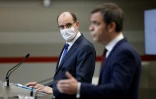 Le Premier ministre Jean Castex avec le ministre de la Santé Olivier Véran lors d'une conférence de presse sur l'épidémie de Covid-19, à Paris, le 14 janvier 2021
