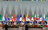 Vue d'ensemble de chefs d'Etat au début d'un sommet des dirigeants du G20 au centre d'expositions Nasrec de Johannesburg (Afrique du Sud), le 22 novembre 2025