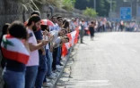 Une chaîne humaine est formée par des manifestants, ici à Nahr al-Kalb dans le nord de Beyrouth, au Liban